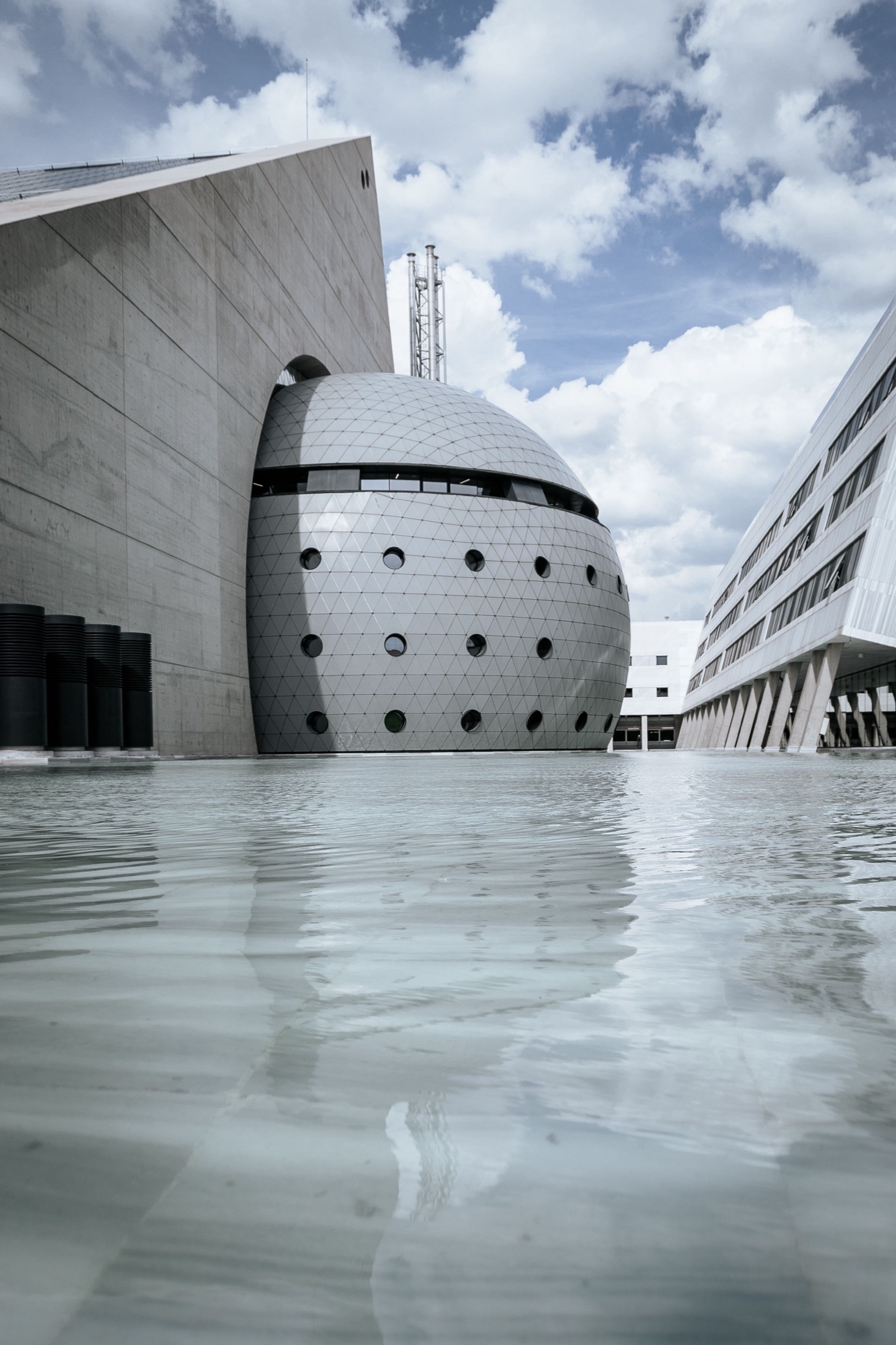 Nightfall Gallery, the sphere reflected in the pool at water level