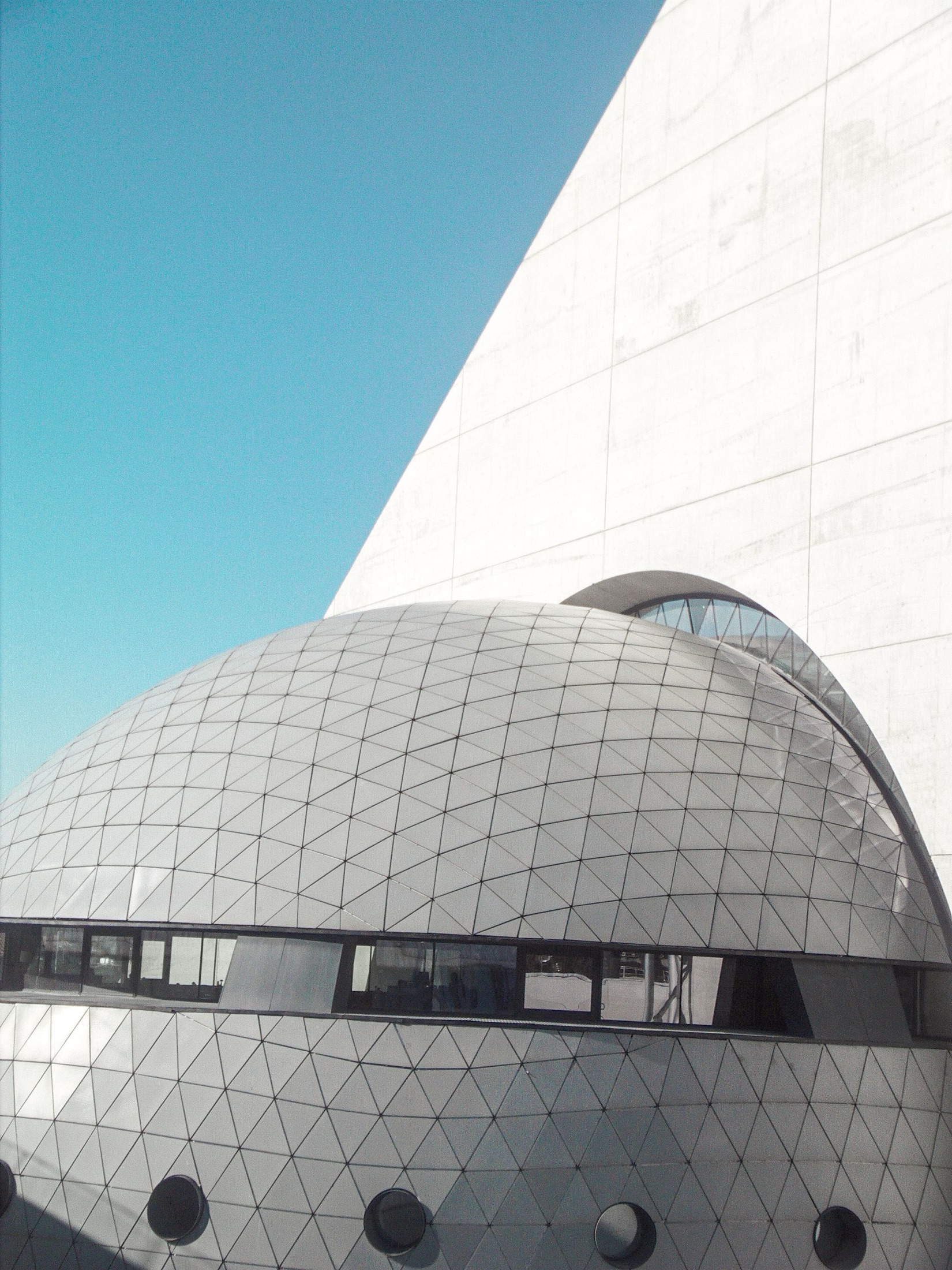 Nightfall Gallery, close detail where the faceted sphere meets the concrete wedge